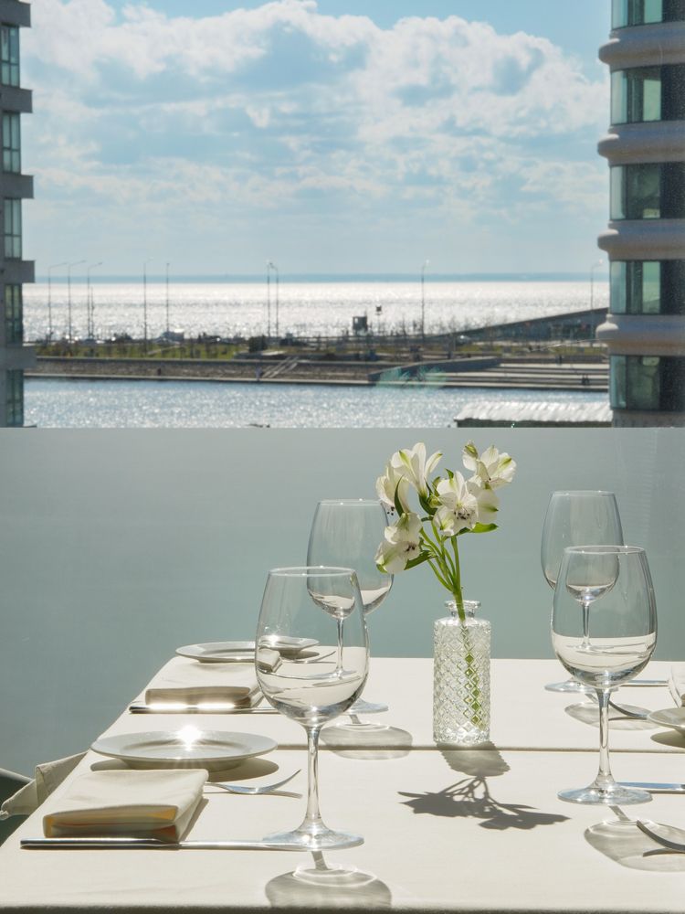 Illustrative waterfront dining setting